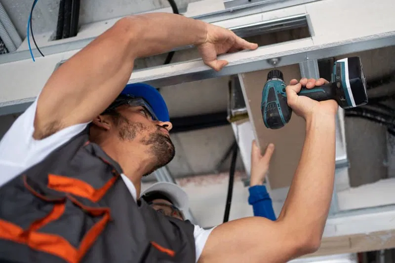 Technician working on a vent